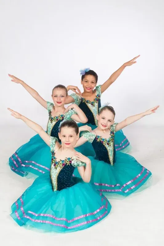 A Group Of Young Girls In Blue Dresses Are Posing For A Picture — International Dance Affair In North Mackay, QLD
