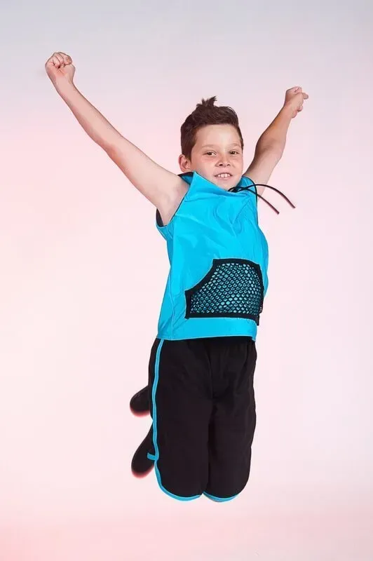 A Young Boy In A Blue Tank Top And Black Shorts Is Jumping In The Air — International Dance Affair In North Mackay, QLD