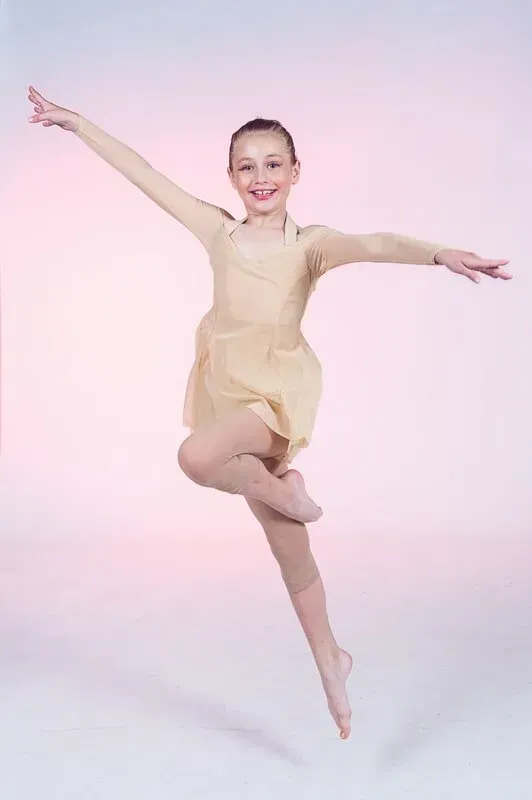 A Woman In A Dress Is Dancing — International Dance Affair In North Mackay, QLD
