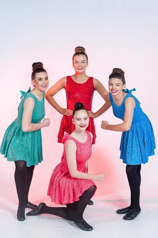 A Group Of Young Women In Sequined Dresses Are Posing For A Picture — International Dance Affair In North Mackay, QLD