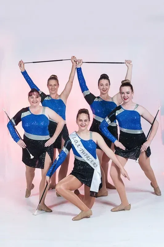 A Group Of Women Are Posing For A Picture While Holding Batons — International Dance Affair In North Mackay, QLD