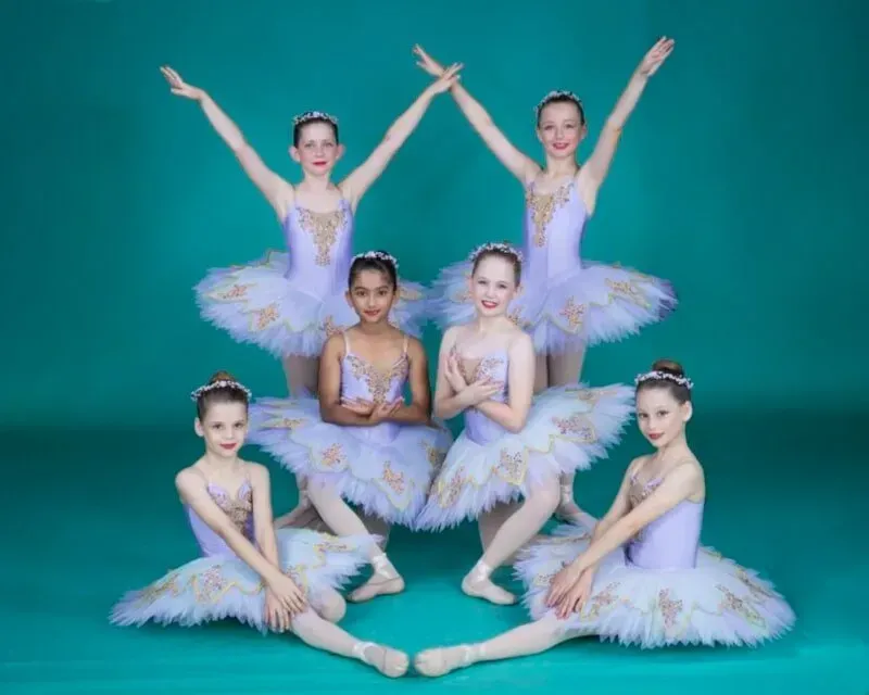A Group Of Women In Purple Tutu Is Posing For A Picture — International Dance Affair In North Mackay, QLD