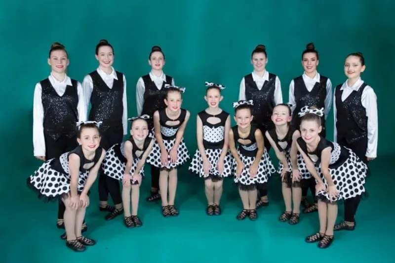 A Group Of Young Girls In Black And White Polka Dot Dresses — International Dance Affair In North Mackay, QLD
