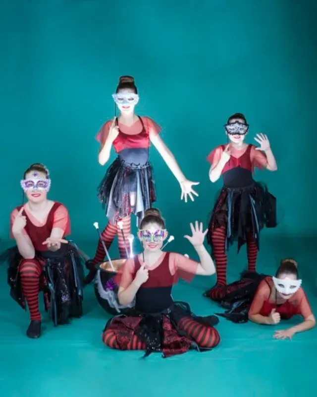 A Group Of Young Girls Wearing Masks Are Posing For A Picture — International Dance Affair In North Mackay, QLD