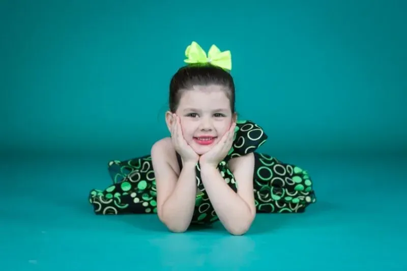 A Young Girl Is On The Floor Posing For A Picture — International Dance Affair In North Mackay, QLD