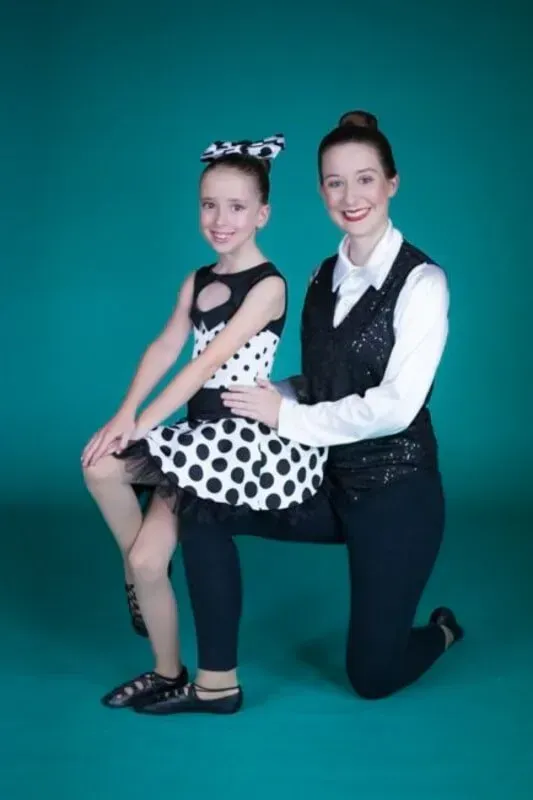 A Woman Is Sitting On The Man's Lap — International Dance Affair In North Mackay, QLD