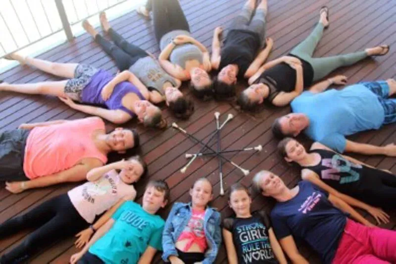 A Group Of People Are Laying In A Circle On A Wooden Floor — International Dance Affair In North Mackay, QLD