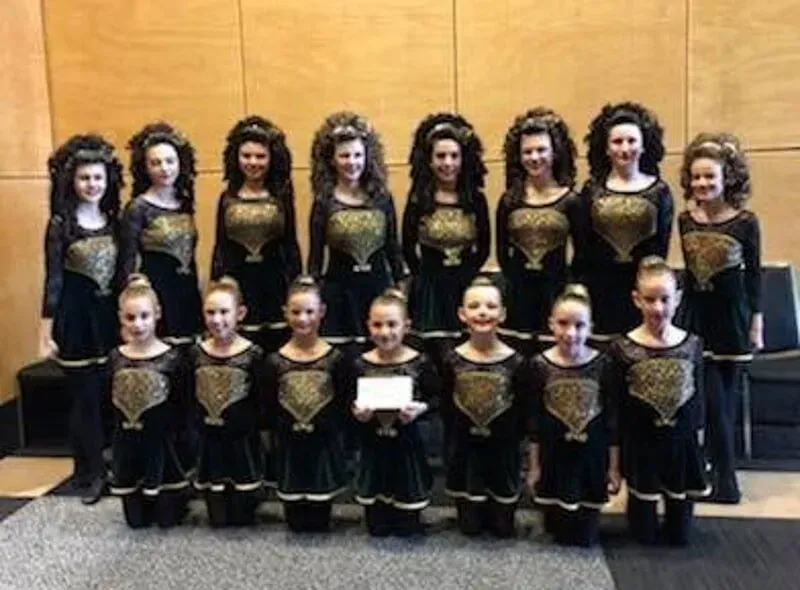 A Group Of Young Girls In Black And Gold Dresses — International Dance Affair In North Mackay, QLD