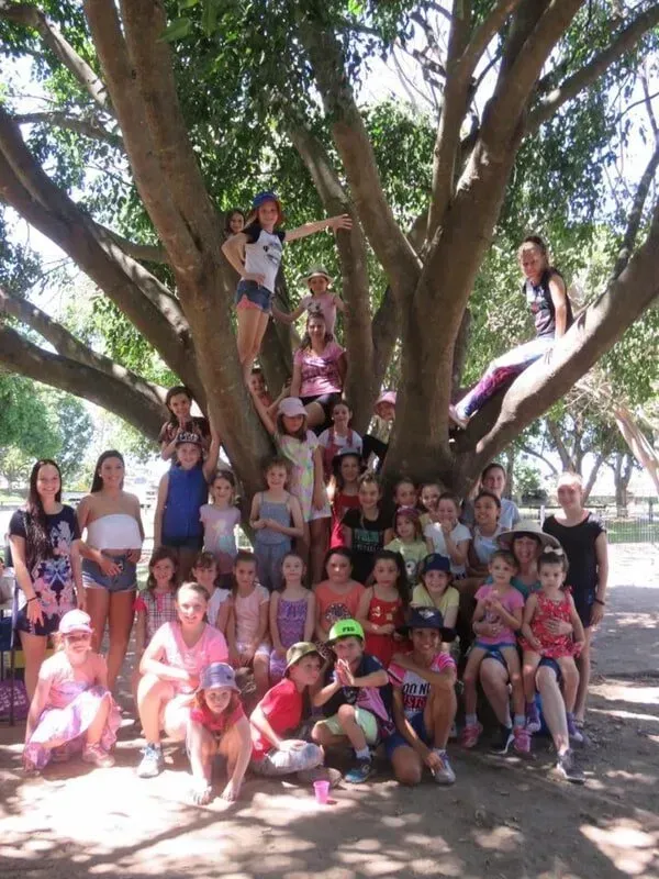 A Group Of Children Are Posing For A Picture Under A Tree — International Dance Affair In North Mackay, QLD