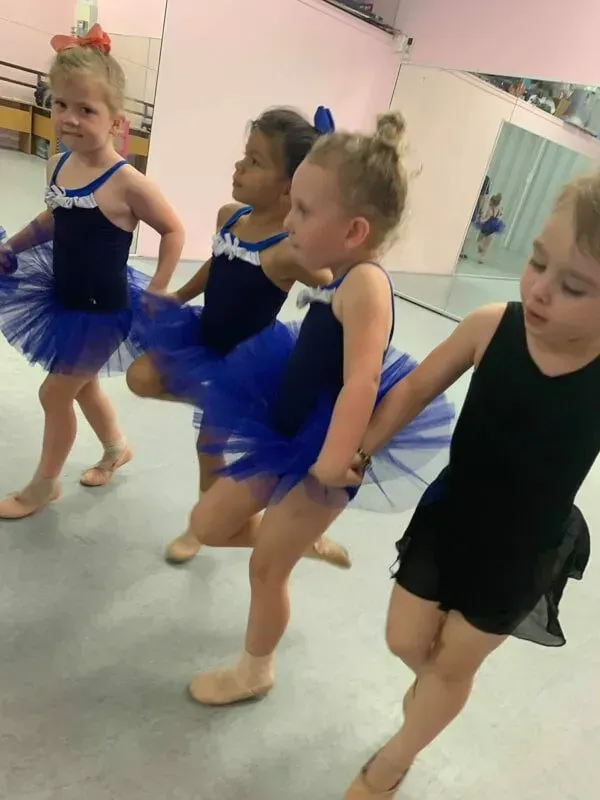 A Group Of Young Girls In Blue Tutus Are Dancing In A Dance Studio — International Dance Affair In North Mackay, QLD