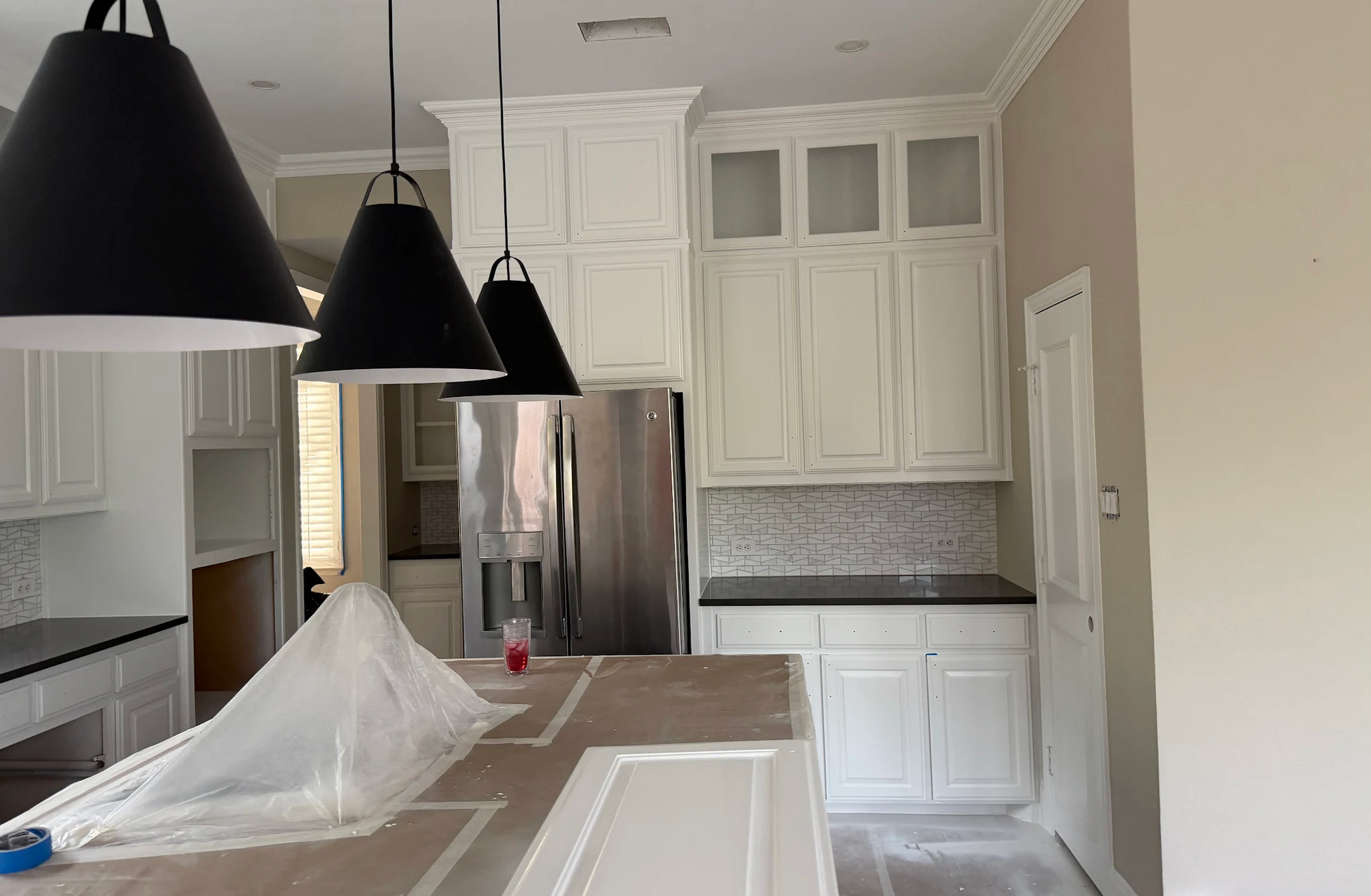 Cabinet and interior painting project by Hutch-N-Son Painting and Drywall in Plano TX