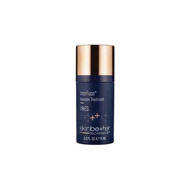 Dark blue skincare product bottle with gold cap, labeled