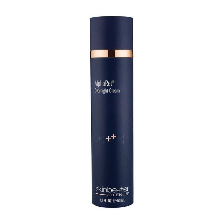 Dark blue skincare bottle with gold accents labeled