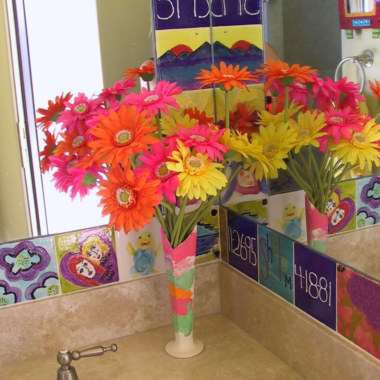 A vase of flowers in front of a mirror with the number 1188 on it