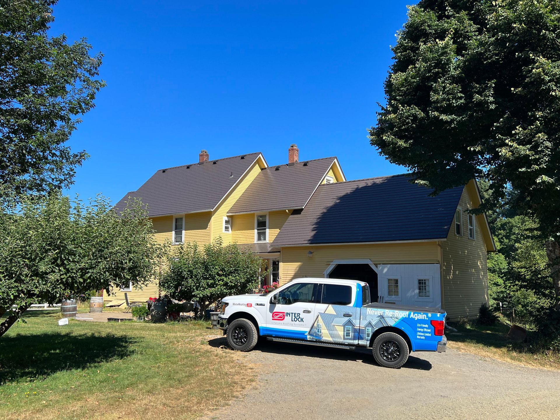 Longview, WA, 98632 ?? — Tudor Brown Interlock® Cedar Shingle + Black Interlock® Lifetime Metal Slate Roofing System