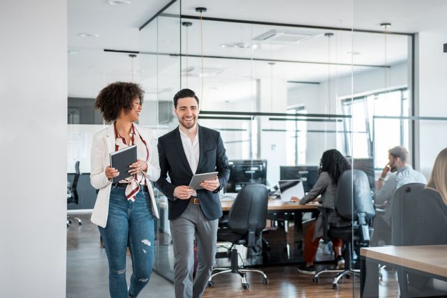 Co-Workers Walking in the Office — Melbourne, VIC — Tech Matters