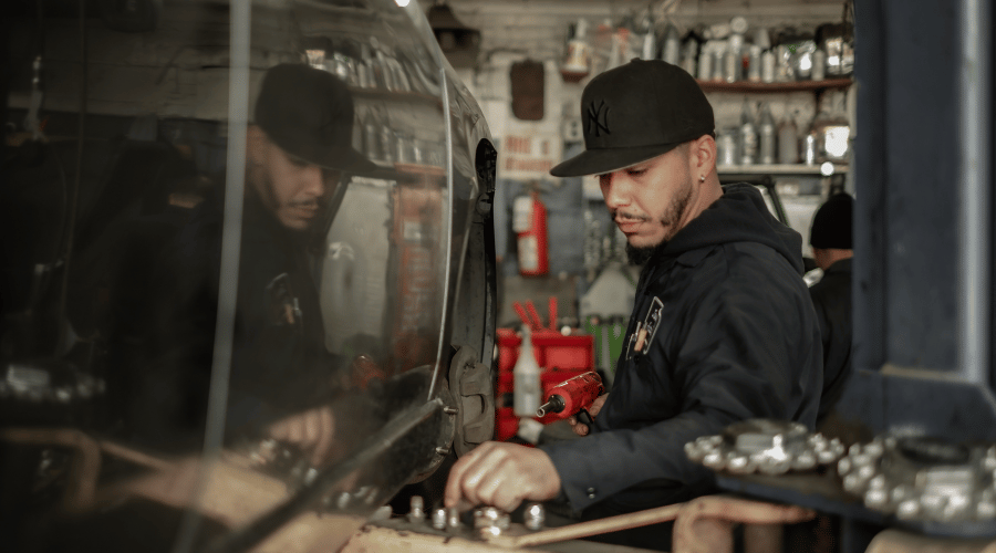 Technician Working on Vehicle