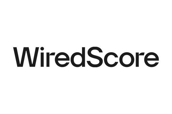 A black and white logo for wired score on a white background.