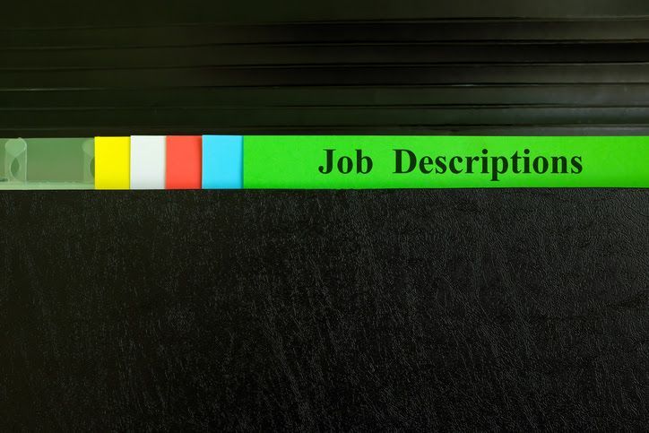 Green binder tab labeled
