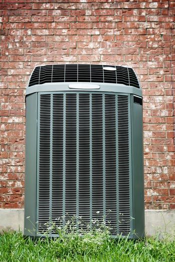 Heat Pump on The Grass — Douglasville, GA — Parks Davis Air Conditioning & Heating
