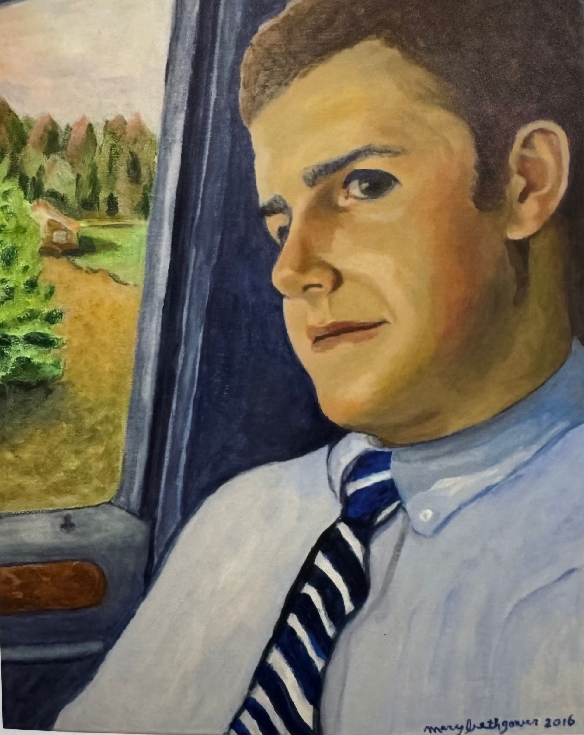 Portrait of a man in a striped tie seated by a car window, looking out at a rural landscape.