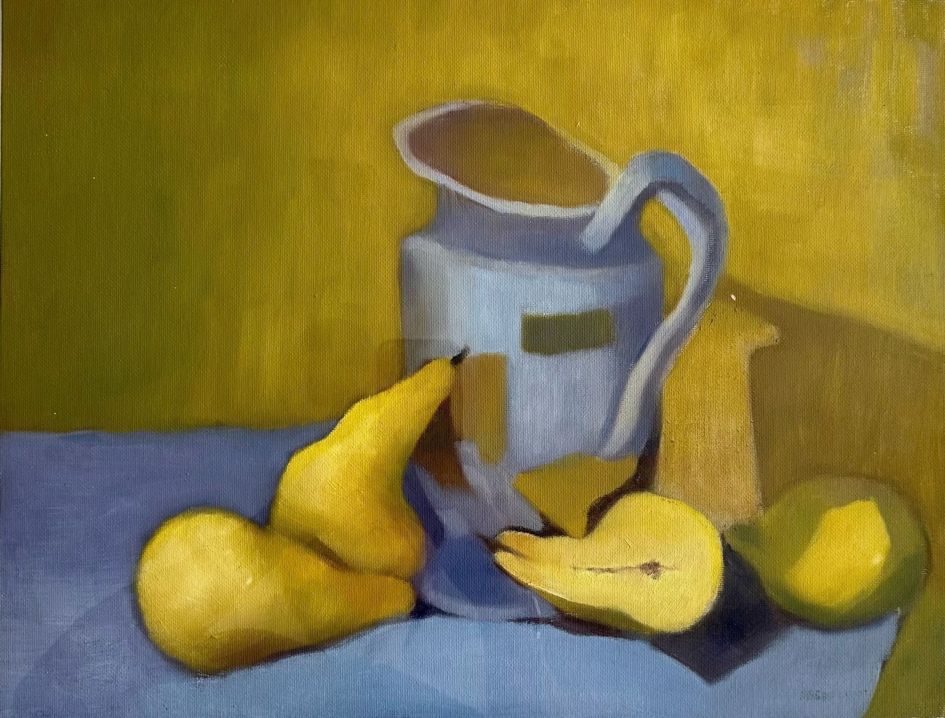 Two yellow bananas beside a white mug on a blue cloth against a yellow background