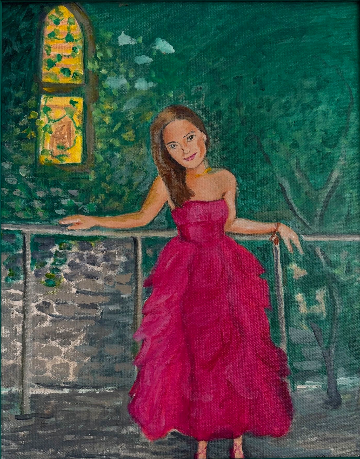 Woman in a bright pink dress leaning on a railing in a green garden setting with a stained-glass window.