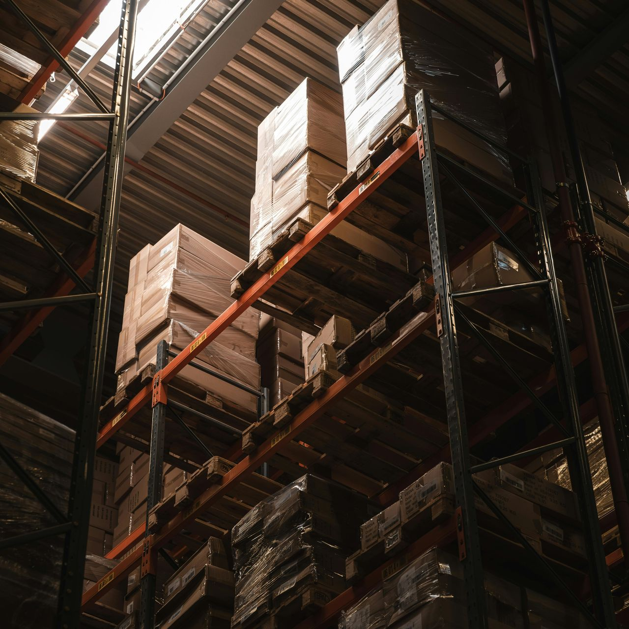 Pallet rack installation crews staging materials for efficient project workflow