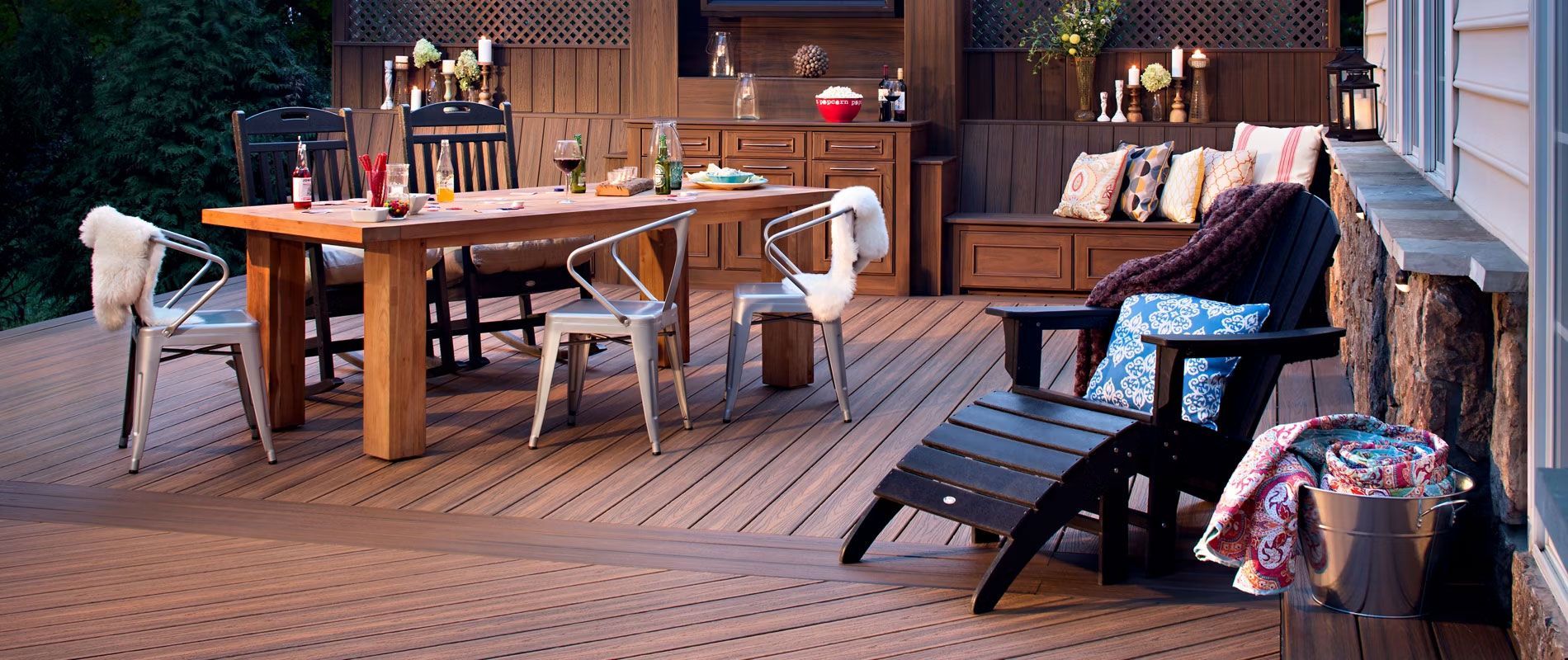 A wooden deck with a table and chairs on it in Central PA