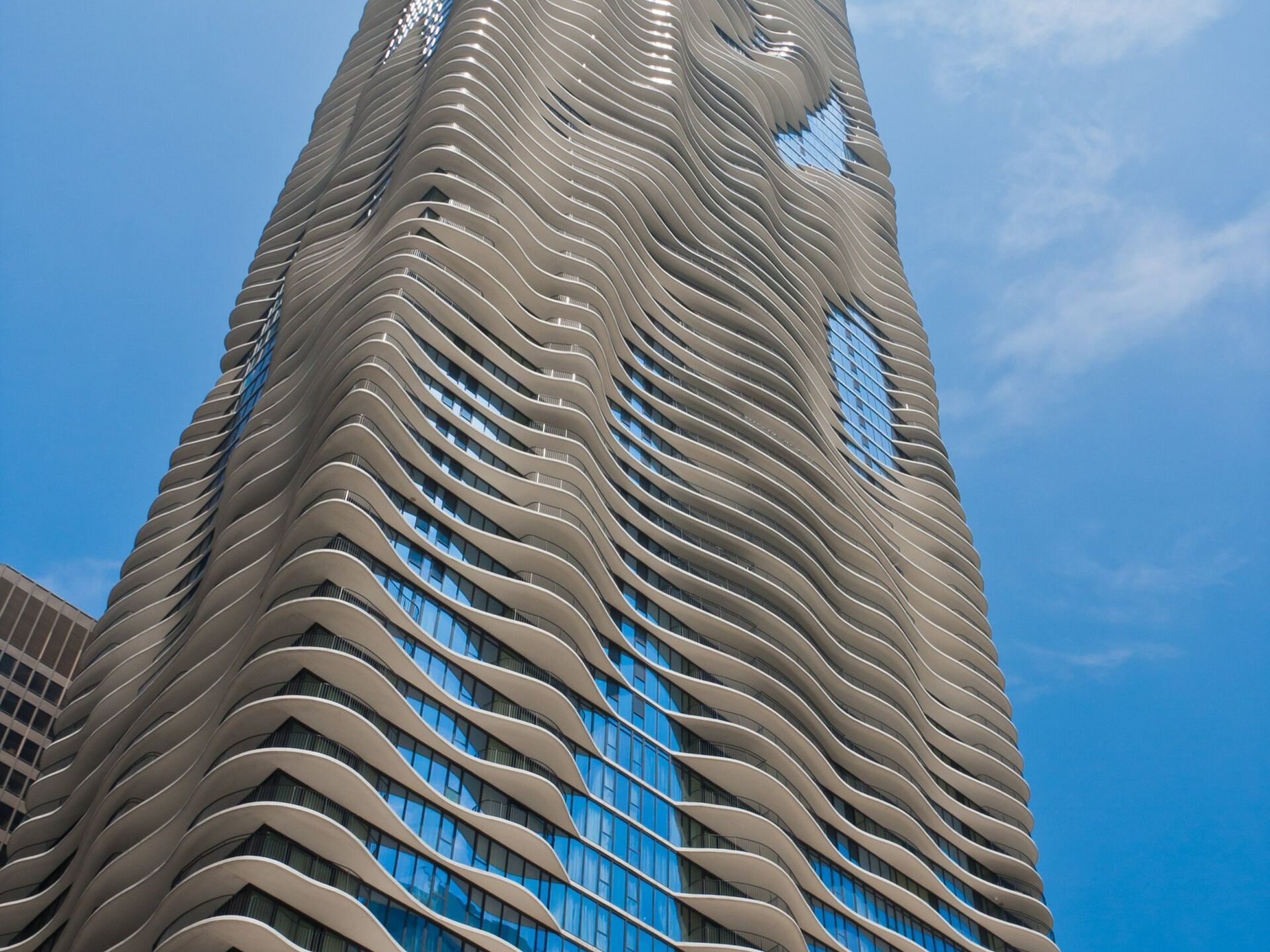 A tall building with a blue sky in the background
