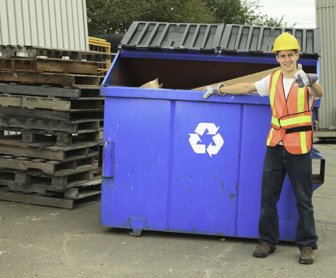 A Worker At Recycling Centre — Waste Disposal in Northern Rivers, NSW
