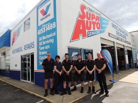 Two Mechanics Standing Beside a Red Tool Chest and Tray of Tools in a Workshop — Supa Auto Services In Bundaberg, North
