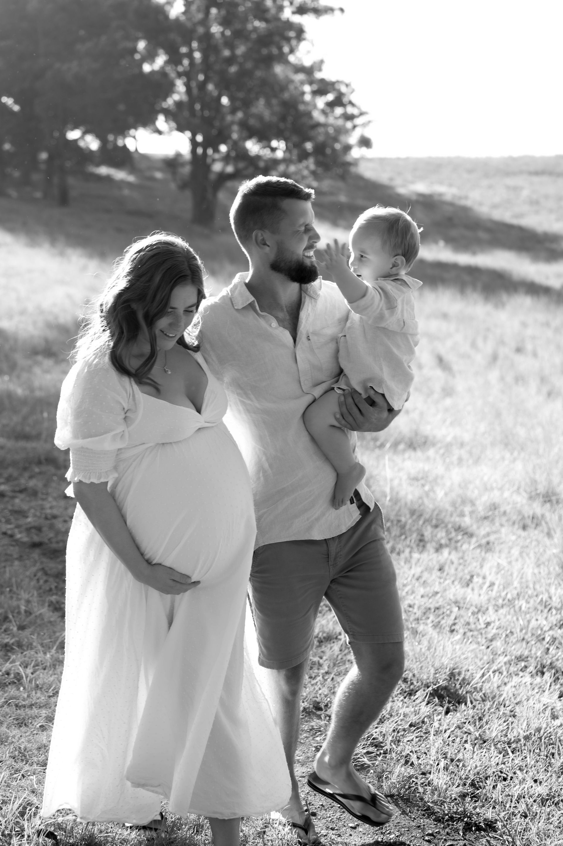 A Man and Two Children Are Standing Next to A River in The Woods — Seed + Salt Photography In Smithtown, NSW