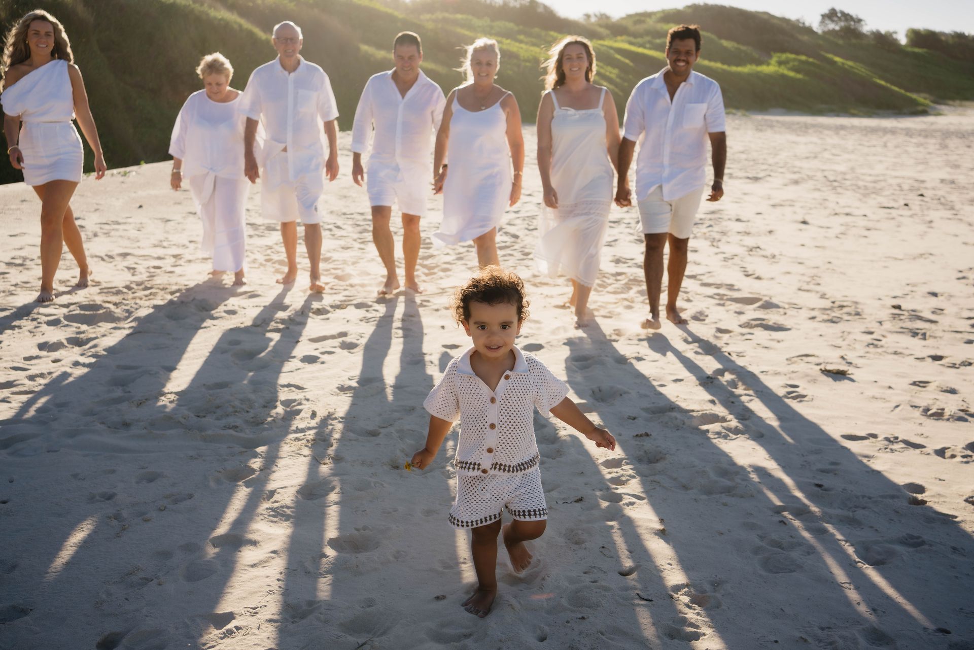 A Man, a Pregnant Woman, and A Little Girl Are Walking on The Ocean — Seed + Salt Photography In Taree, NSW