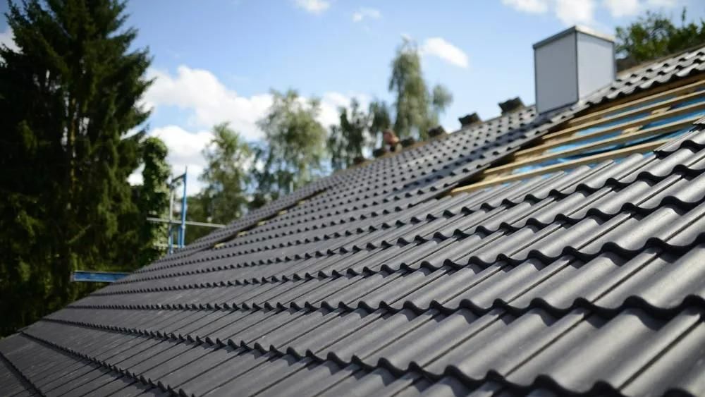 A Roof with A Lot of Tiles on It Is Being Built — Gillespie Plumbing in Grafton, NSW