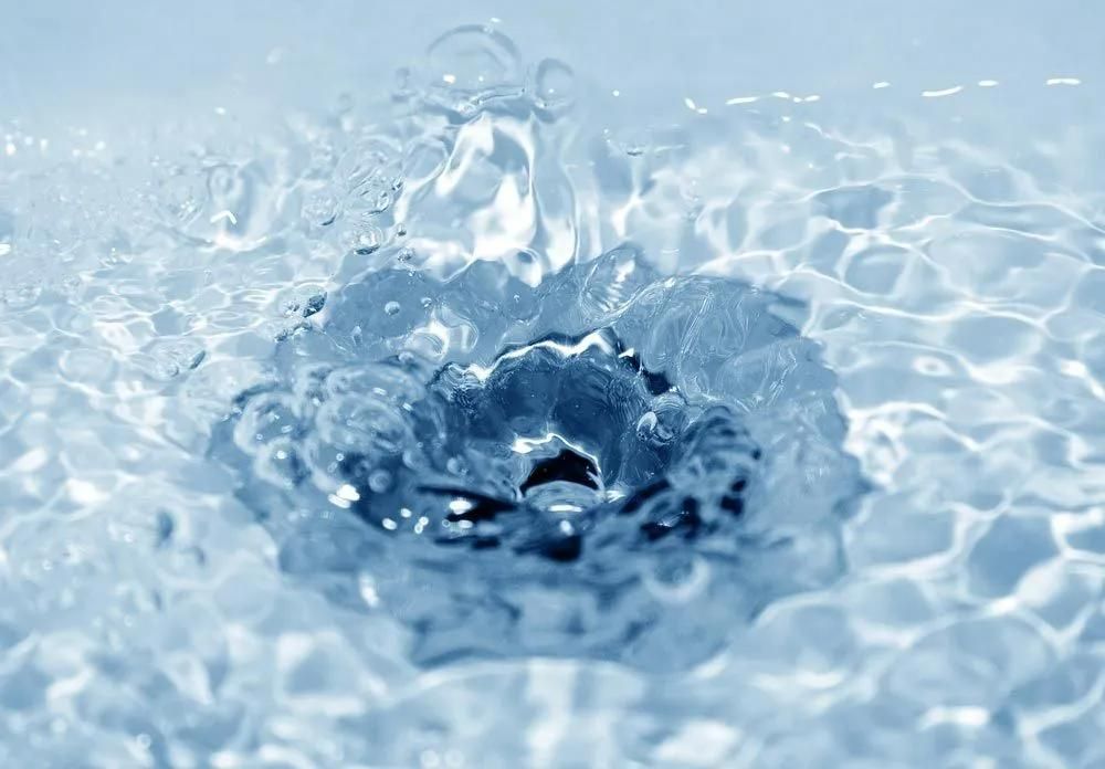A Drop of Water Is Falling Into a Pool of Water — Gillespie Plumbing in Grafton, NSW