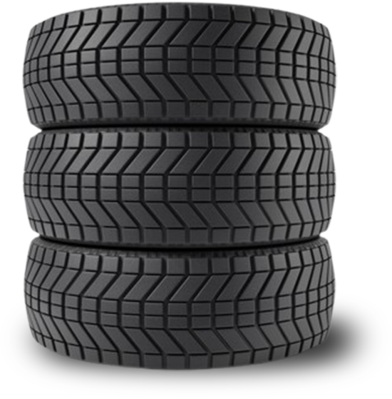 Three stacked black car tires on a white background