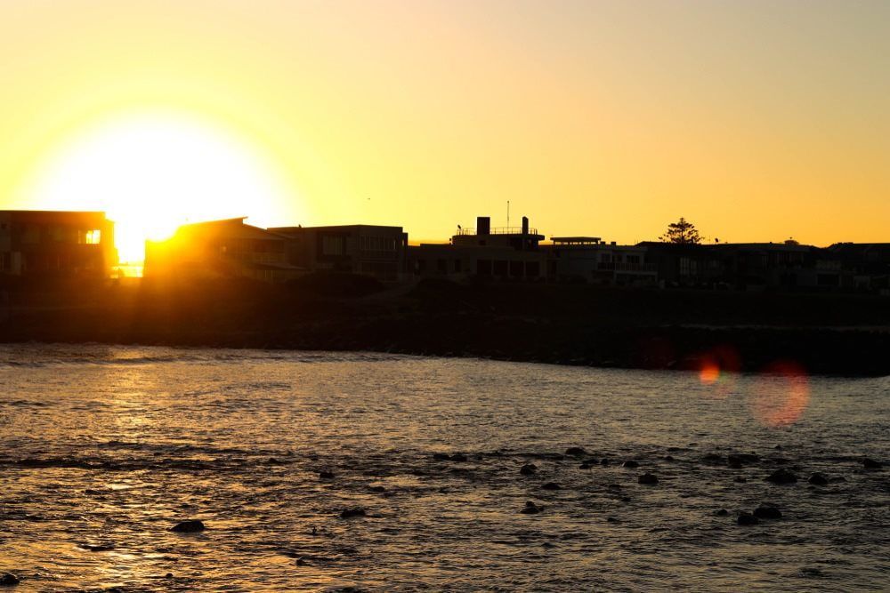 Captivating city view during sunset — Commercial Waterproofing in Shellharbour, NSW