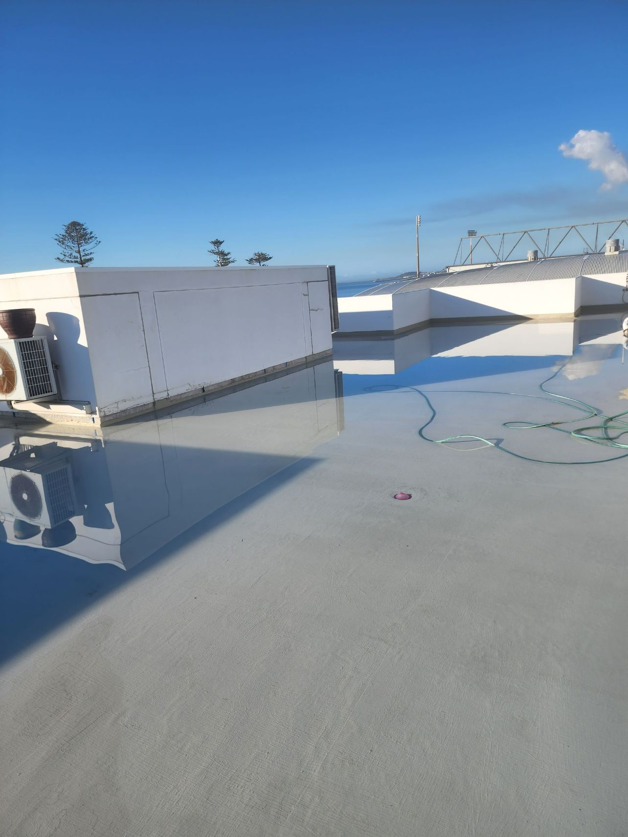 After Look Of Concrete Floor Of The Building Rooftop — Leak Free Waterproofing in Unanderra, NSW