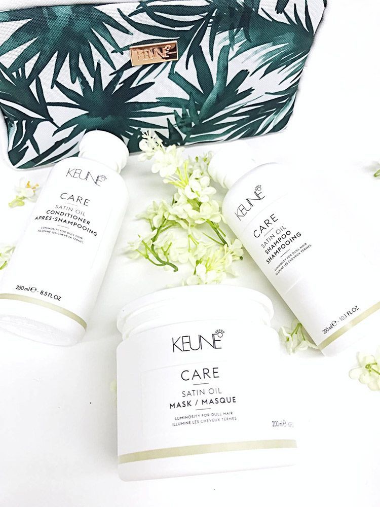 A Bottle of Keune Care Shampoo, Conditioner, and Mask are on a Table Next to a Purse — Instyle Hair on B in Berserker, QLD