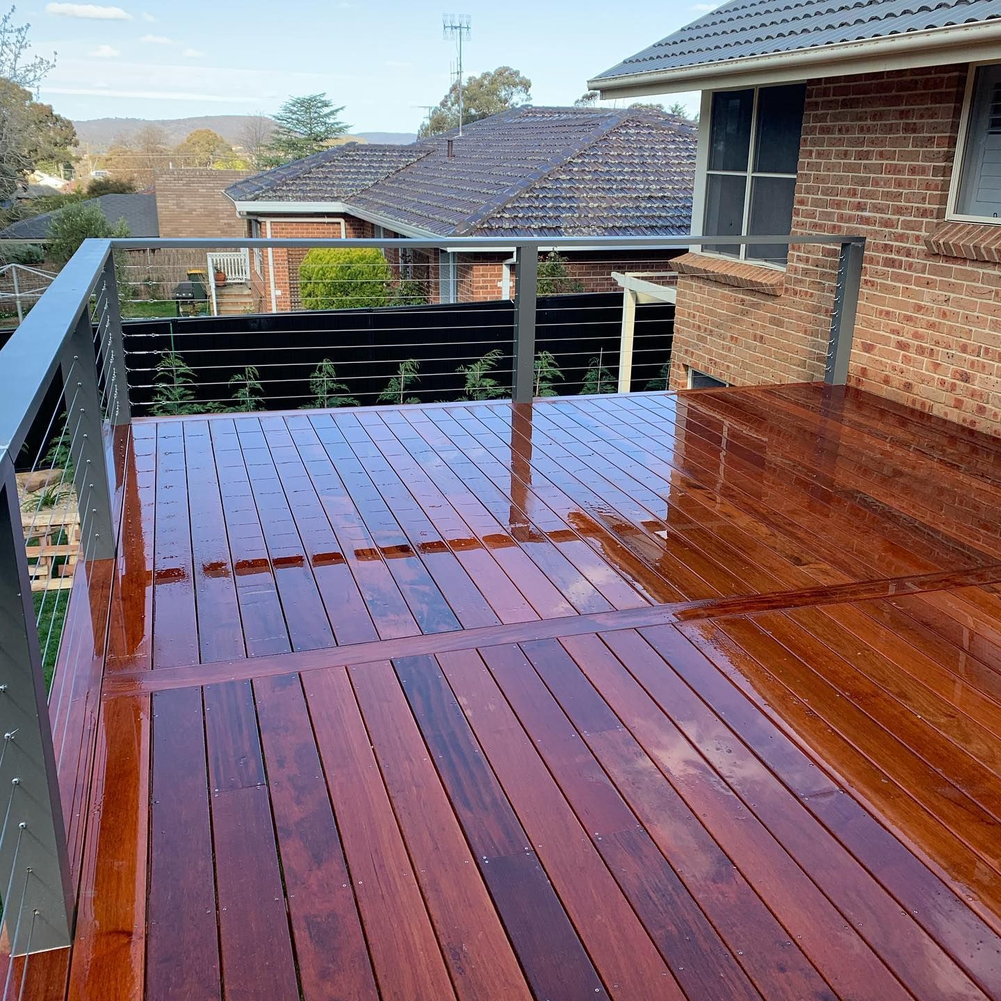 Wooden Deck With Metallic Railing — J&C Quality Construction in Goulburn, NSW