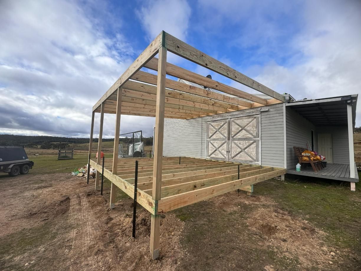 Construction of a Wooden Deck With a Partially Built Roof Extension — J&C Quality Construction in Goulburn, NSW