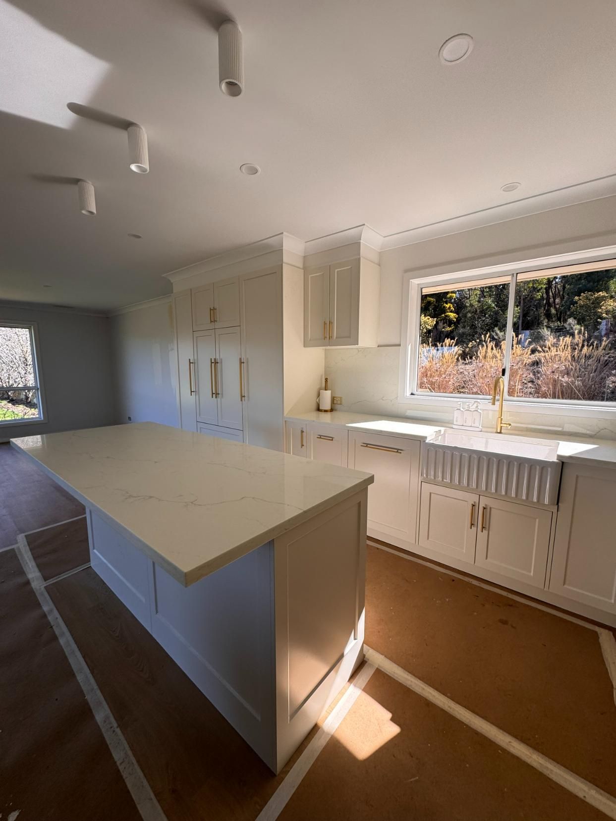 Modern White Kitchen With Island — J&C Quality Construction in Southern Highlands, NSW