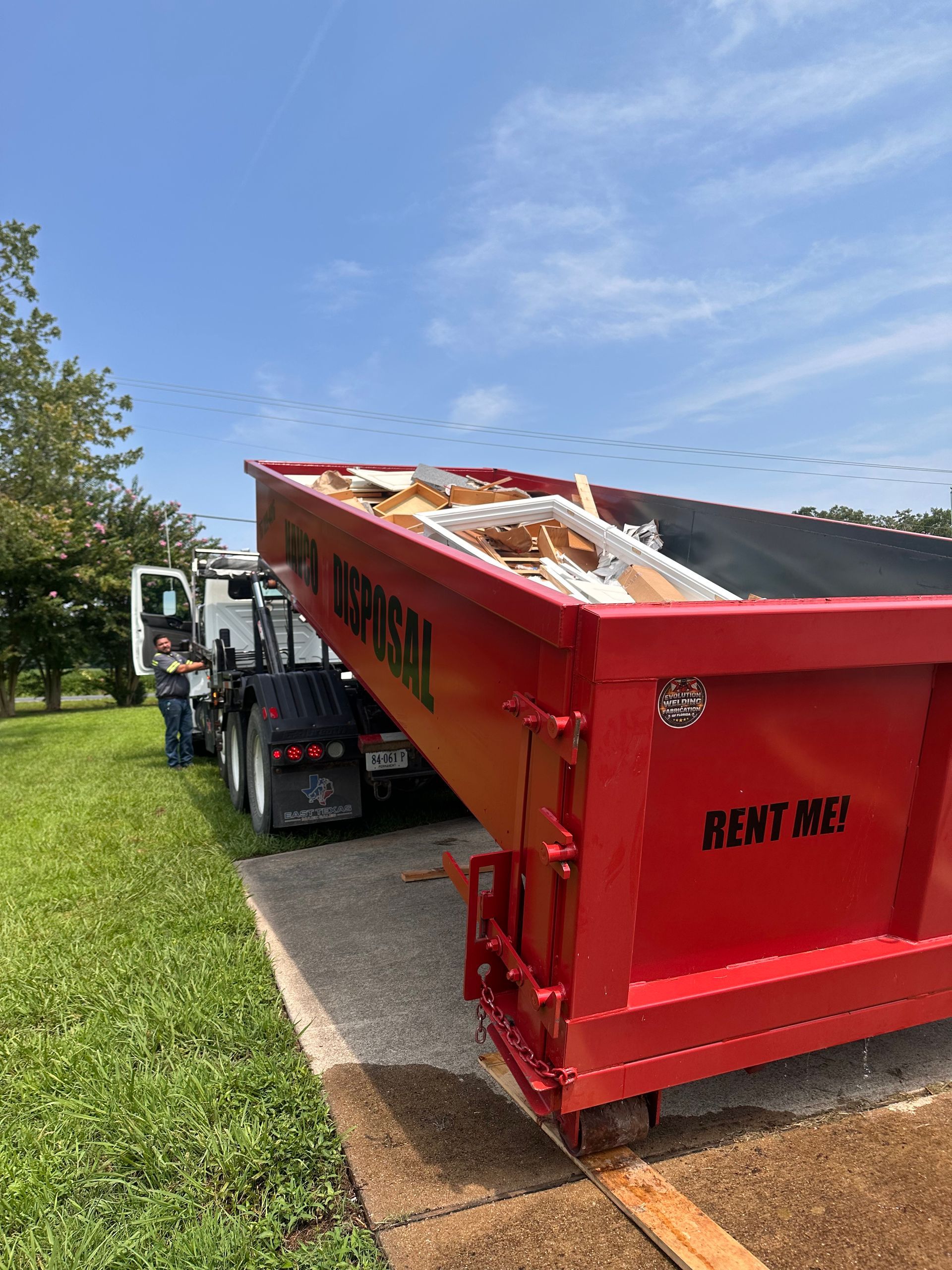 truck with roll off dumpster 