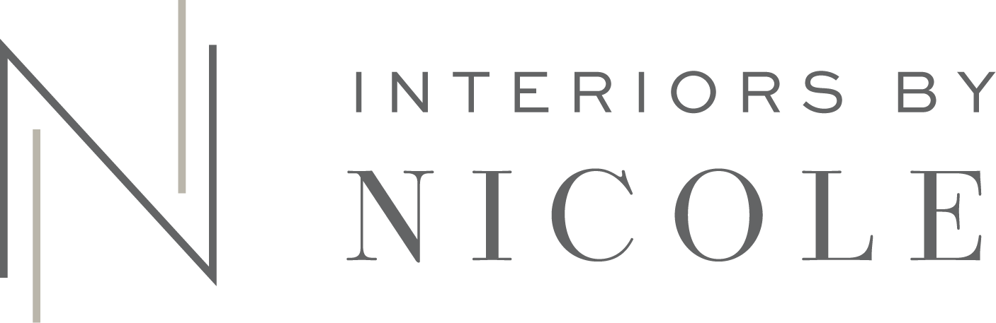 Logo reading &ldquo;Interiors by Nicole&rdquo; in gray text with a stylized &ldquo;N&rdquo; icon.