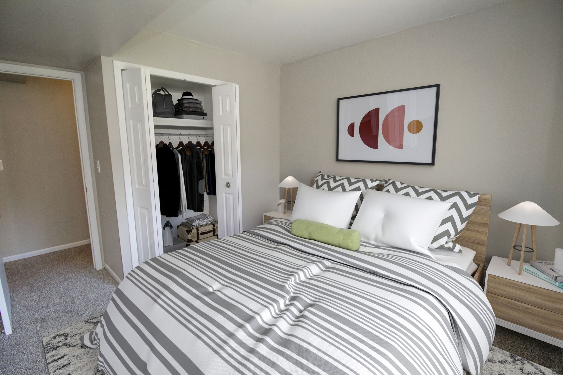 A bedroom with a bed , nightstand , and closet.