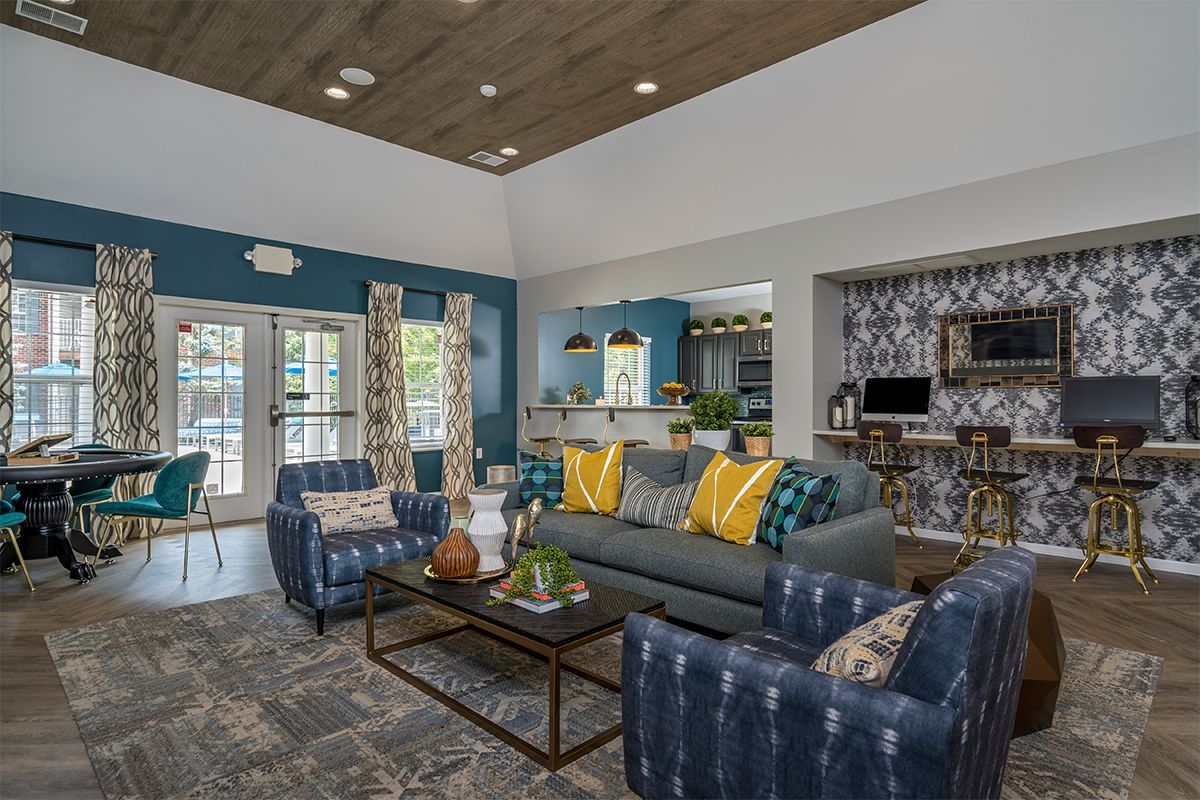A living room filled with furniture and a couch.