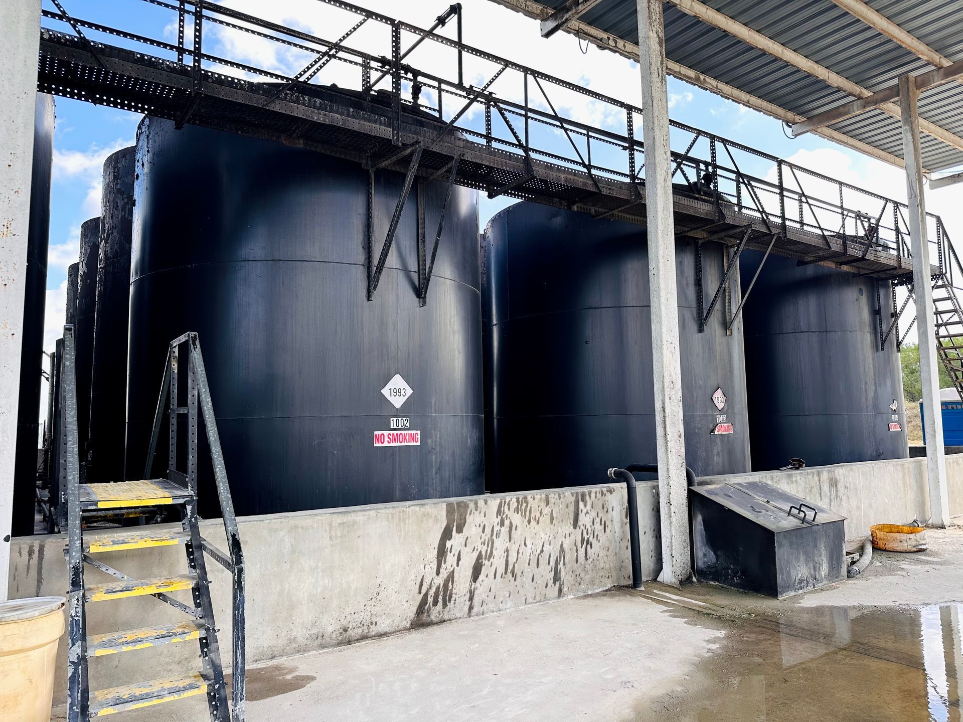 Worker Doing Hazmat Cleanup— Somerset, TX — Approved Oil Services LLC Worker Doing Hazmat Cleanup— Somerset, TX — Approved Oil Services LLC