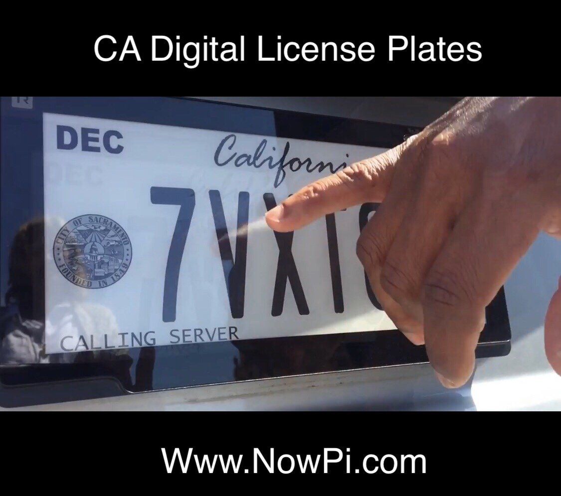 A person is pointing at a california license plate