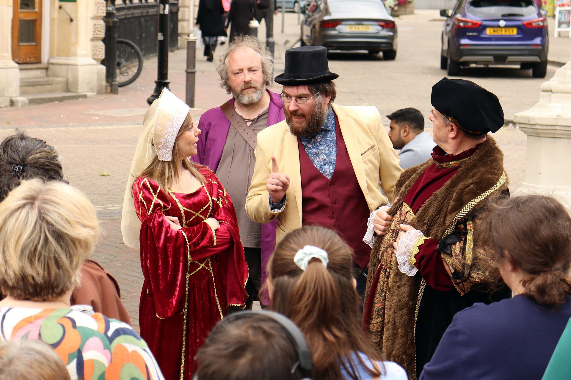Actors in historical dress guiding visitors through historic sites in Aylesbury for heritage open days